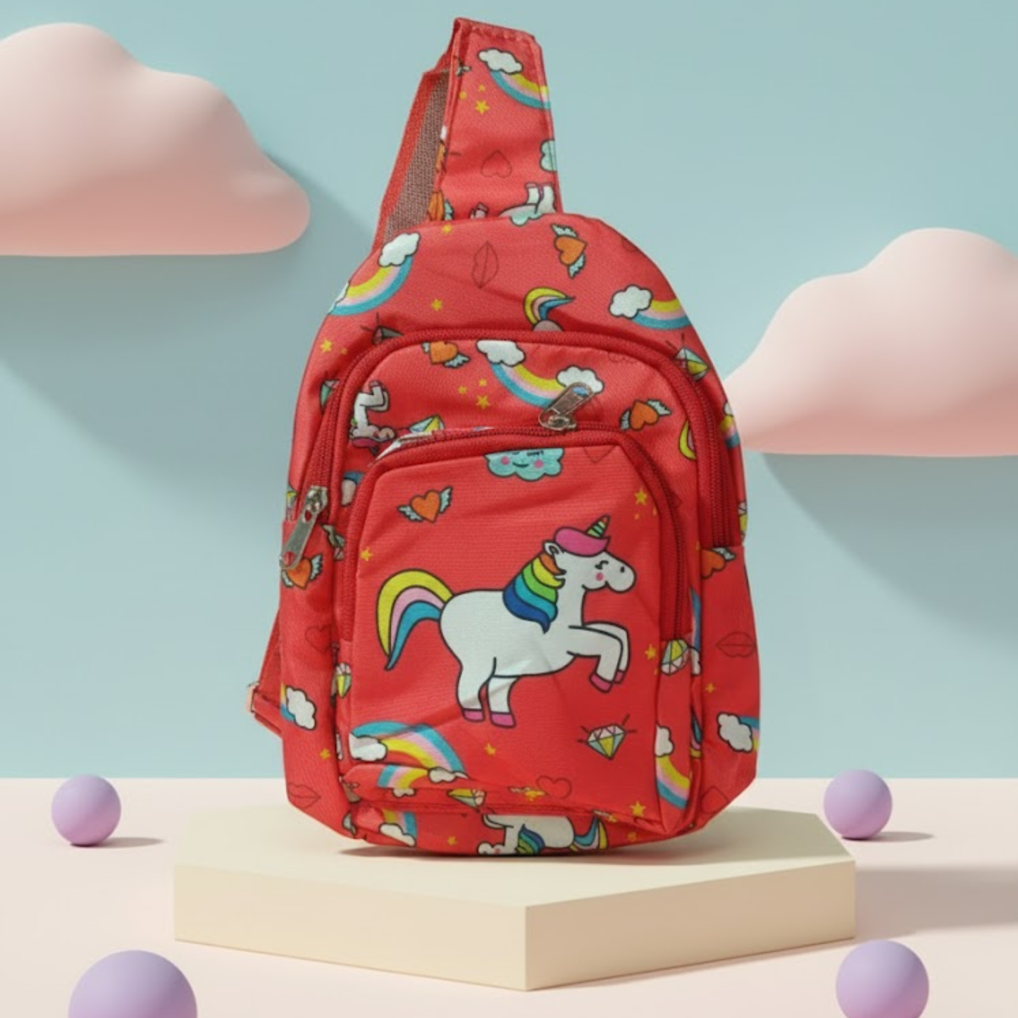Red kids' unicorn sling bag with colorful rainbow prints for kids travel and everyday use